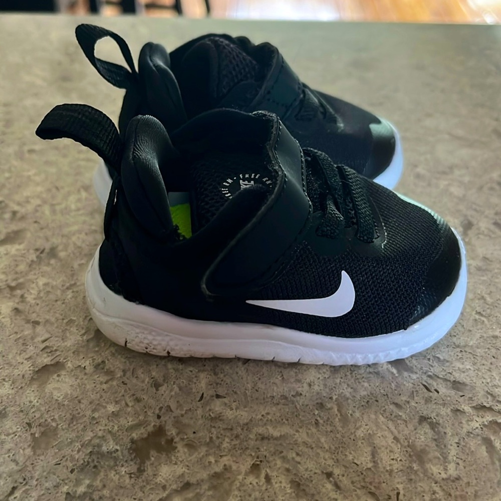 Black and white infant Nikes size 2